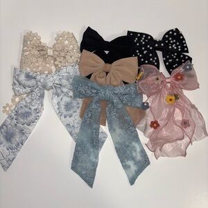 LOT OF 7 HAIR BOWS. RIBBON BOWS, FLORAL BOWS, DANTY FLORAL